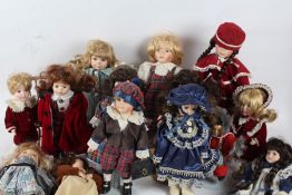 Collection of mostly porcelain headed doll, each in costume, with dolls chairs and a bench (qty)