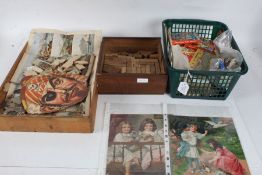 Collection of old wooden puzzles, a box containing wooden blocks, collection of birthday cards,