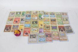 Collection of Pokemon cards, circa 1999, approx. forty-four in total and a Pokemon ball