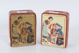 Two mid 20th century tin plate money boxes, each with counters to the front in which the door