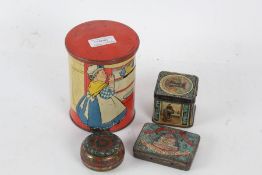 Four various tins, to include a money box of cylindrical form, Capstan Navy Cut example,