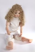 Bru Jne. reproduction bisque headed doll, with brown eyes and closed mouth, long curly hair, with