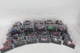 Large collection of model motorbikes, all housed in a plastic casing, with a folder "Champion Racing