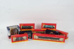 Collection of railway carriages and rolling stock, to include two Bachmann 12 ton Mogo Vans, GWR