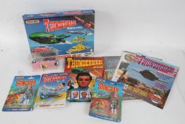 Thunderbirds, to include Matchbox Rescue Pack, Matchbox Scott Tracy, one Thunderbirds comic dated