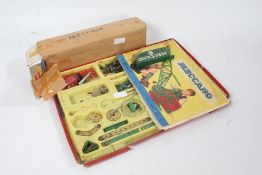 Collection of Meccano pieces, with a tray and Outfit No. 3 guide (qty)