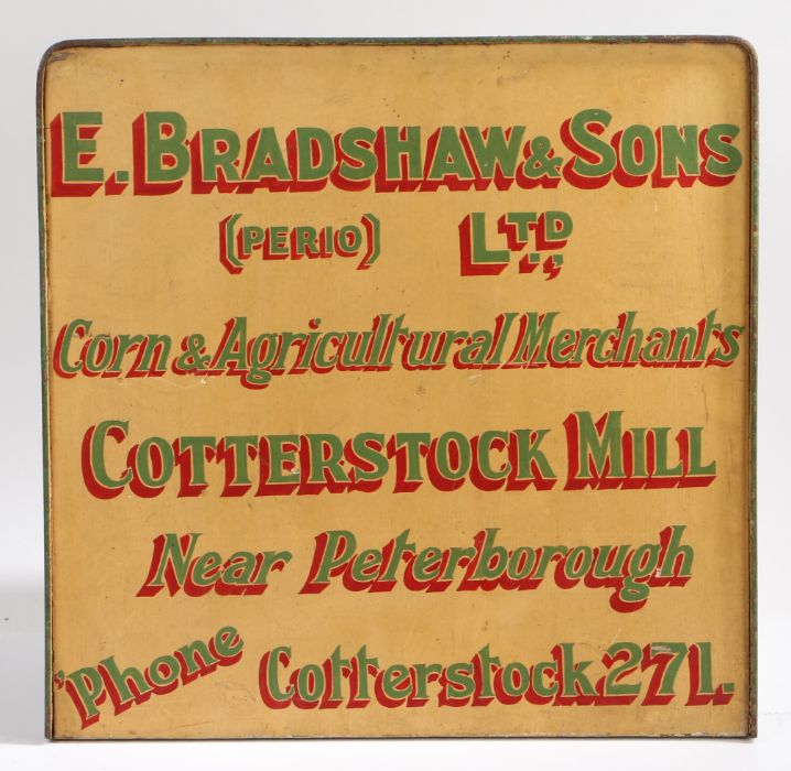 E.Bradshaw & Sons Ltd. Corn & Agricultural Merchants advertising sign, painted on wood with metal