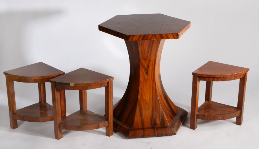 Walnut veneered occasional table, in the Art Deco taste, having hexagonal top, tapering column and