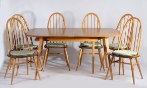 Ercol blonde extending dining table, with foldout leaf, approx. 226cm long when extended, 152cm when