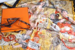 Hermes Paris "Fairytales" silk scarf, designed by Phillipe Dumas, housed in an original orange