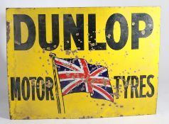 Enamel advertising sign, the yellow ground with black lettering "DUNLOP MOTOR TYRES" with fluttering