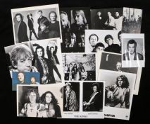 12 x Rock press release photographs. Artists to include Eric Burdon,Roger Daltry, Peter Frampton,The