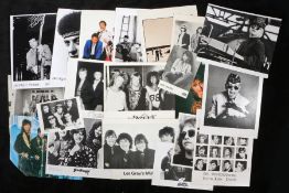 70's Rock and Glam related press release photographs. Artists to include Elton John, Suzi Quatro,