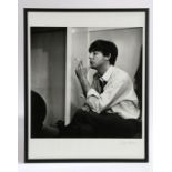 Hand printed photograph of Paul McCartney by Jane Bown, the orginal image taken in 1963, signed by