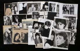 25 x Beatles and Stones related press release photographs. Sold as part of the East Anglian Music