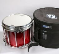 Pearl Championship Pipe Band Series snare drum, 12x14 in red together with a carrying case and