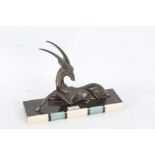 Art Deco bronzed antelope, raised on marble base, 30cm long