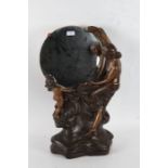 Art Nouveau style gilded plaster mirror, the circular mirror raised on a figural base in the form of