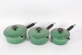 Set of three Le Creuset graduating saucepans, in green (3)