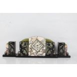 Art Deco black slate, marble and onyx three piece clock garniture, centred with a silvered diamond