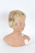 Art Deco period plaster bust, in the form of a lady with blonde hair, 33cm tall