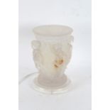 Large frosted table lamp, decorated four putti and raised on acrylic base, 31cm tall