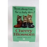 Reproduction advertising sign on metal, "Cherry Blossom Shoe Polish", 70.5cm tall, 45cm wide