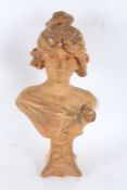 Early to mid 20th century terracotta coloured bust, in the form of a lady in the Art Nouveau