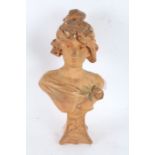 Early to mid 20th century terracotta coloured bust, in the form of a lady in the Art Nouveau