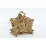 Art Nouveau style brass letter rack, with stylised lady to the front, 17cm wide