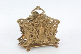 Art Nouveau style brass letter rack, with stylised lady to the front, 17cm wide