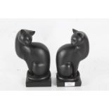 Two Artforum resin cats inspired by the works of Heinz Warneke, titled "Serenity" and "Elegance",