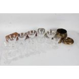Quantity of wine glasses and champagne saucers, a small glass rose bowl and various Eastern brass
