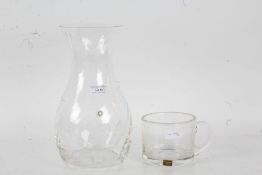 Dartington glass vase, of swirling stylised form, 26cm tall, and a Wedgwood crystal glass mug (2)