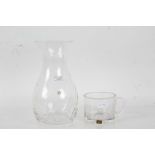 Dartington glass vase, of swirling stylised form, 26cm tall, and a Wedgwood crystal glass mug (2)