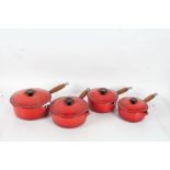 Set of four Le Creuset cast iron graduating saucepans, in red (4)