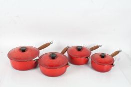 Set of four Le Creuset cast iron graduating saucepans, in red (4)