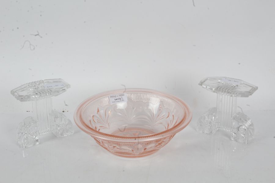 Moulded puce glass bowl with fleur de lis decoration, 21cm diameter, pair of moulded two branch