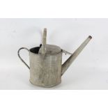 Galvanised watering can