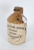 Stoneware advertising bottle, 'Minister Bros., Botanical Brewers, Ipswich 1932, 28cm tall