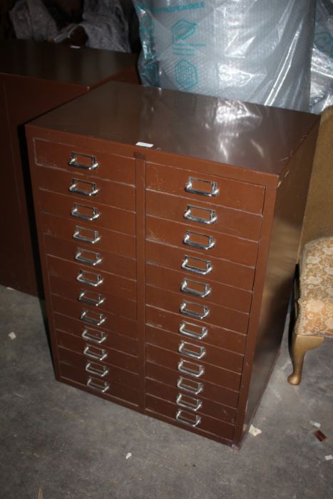 Brown metal double filing cabinet, with two banks of twelve drawers, 61cm wide, 84.5cm high, 41cm
