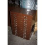 Brown metal double filing cabinet, with two banks of twelve drawers, 61cm wide, 84.5cm high, 41cm