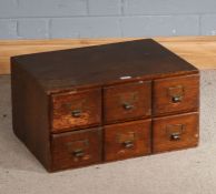 20th century oak table top cabinet of six draws, 56cm wide 41cm deep 30cm high