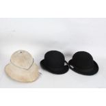 Two bowler hats and a Pith hat, G. A. Dunn & Co Ltd size 6 3/4 together with Battersby & Co size 7