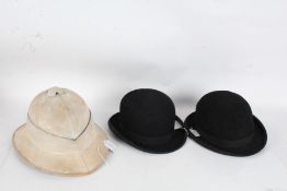 Two bowler hats and a Pith hat, G. A. Dunn & Co Ltd size 6 3/4 together with Battersby & Co size 7