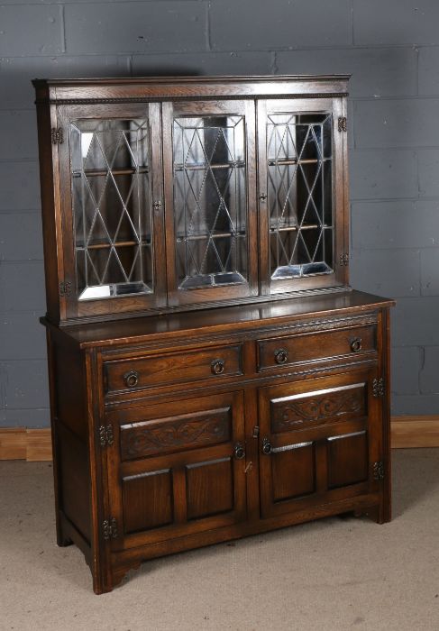 20th century oak dresser, the leaded glazed upper section fitted three doors, above two short