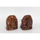Pair of 19th Century treacle glazed sash window rests, with lion mask decoration, 13cm high