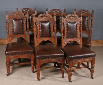 Set of six 20th century oak dining chairs with leather seats and backs, 104cm high (6)