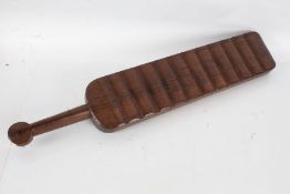 19th century treen washing bat, 72cm long