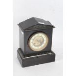 A black slate mantle clock with an arched pediment with a cream dial with Arabic numerals AF, 27cm